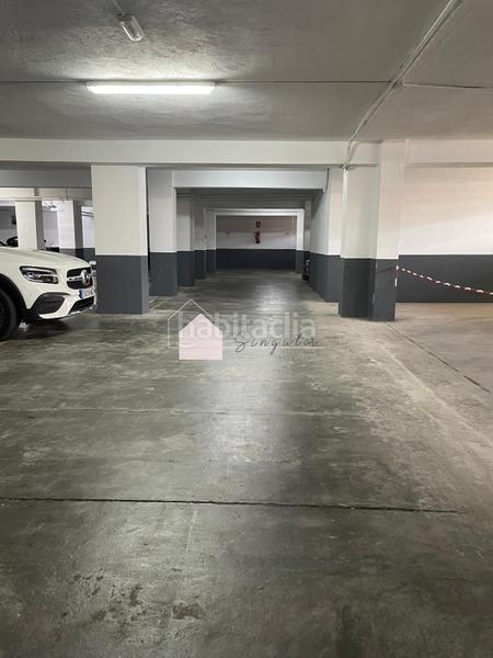 Foto d2dadcc0-d8cb-4483-8ddd-318c55eee0db. Parking voiture dans Coia Vigo