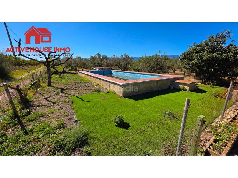 Foto c482304a-79e8-4cb6-99d3-04ac0f803e78. Masía oportunidad! finca rústica con casa, piscina y garaje en Santa Bàrbara