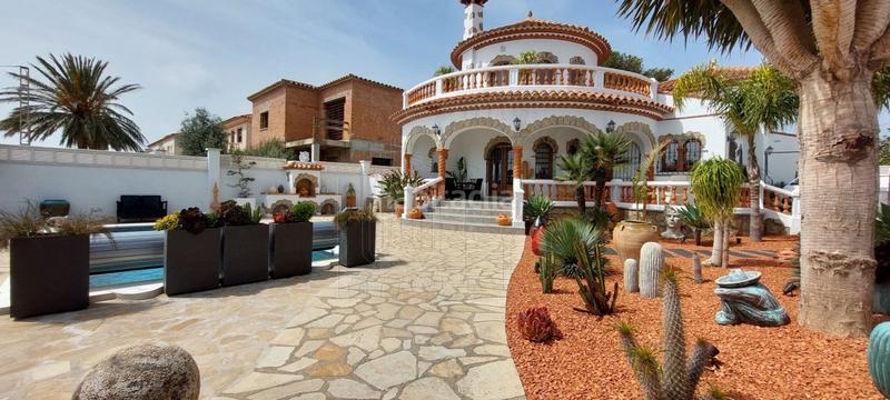 Foto 9fdc24c2-4636-4424-a614-7cf5fb15ed77. Chalet mit heizung parking pool in Centre Miami Platja