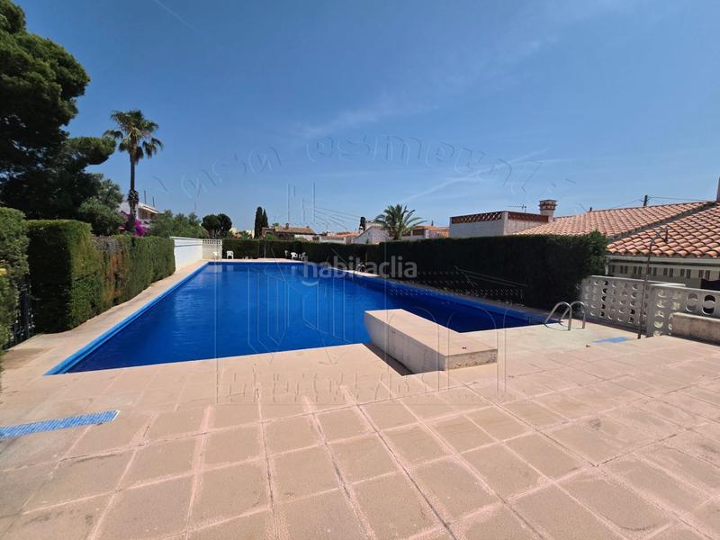 Foto 5cc067e5-460f-4f7b-bf73-900f77fa7410. Casa amb aparcament piscina a Centre Miami Platja