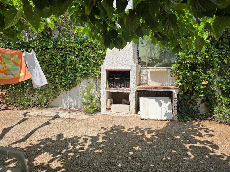 Foto fd54f586-272a-4178-8bf1-43c44a9748ae. Casa amb aparcament piscina a Centre Miami Platja