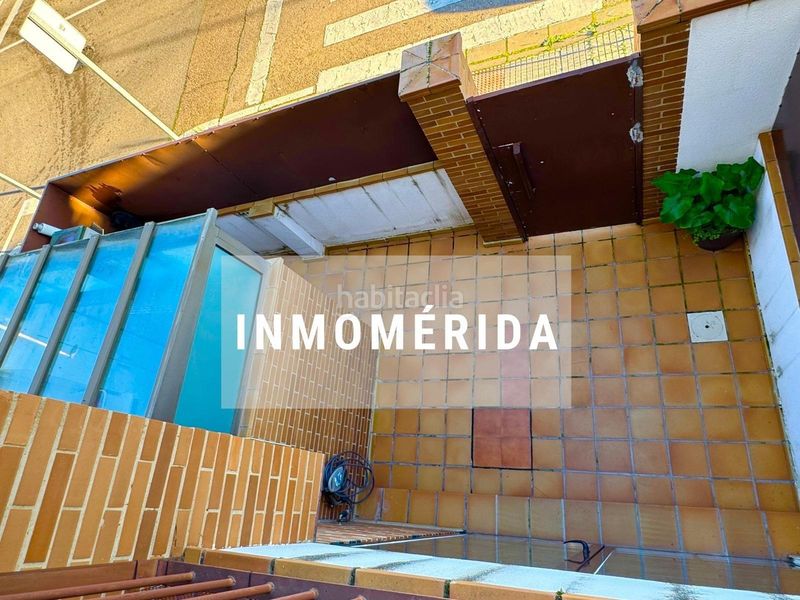 Foto 1bbf3361-c5bf-4283-afda-38bb19a196d5. Casa adossada amb calefacció aparcament piscina a Mérida