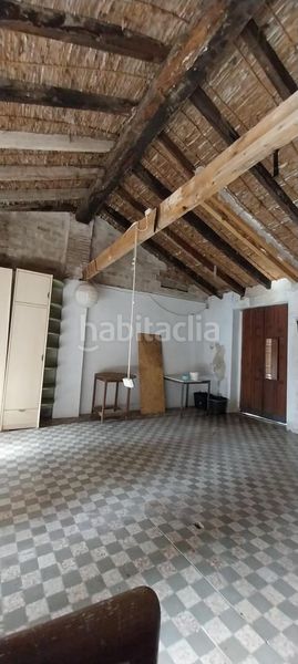 Foto 44b9c426-5834-4fda-8a2c-4392bbd5189b. Casa aparellada a Centre Alzira