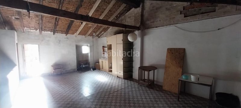 Foto 9c9fe4b7-65a1-4e49-bb25-61940854a2c5. Casa aparellada a Centre Alzira