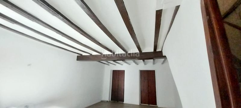 Foto 04593668-06d5-4381-bc39-8a7f9a2138ec. Casa aparellada a Centre Alzira