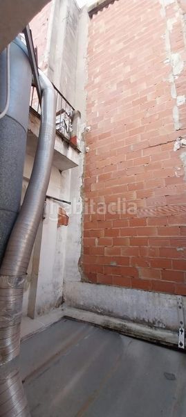 Foto 48bc2401-7eea-4724-9dd3-a0d91b2c0262. Casa aparellada a Centre Alzira