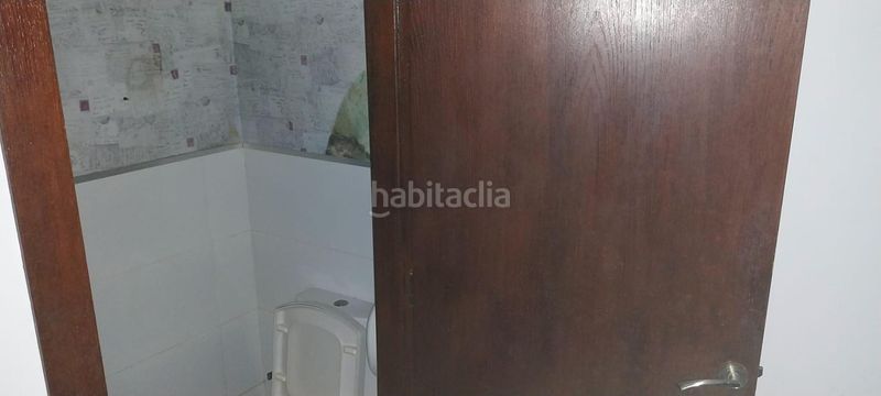Foto 49e99fb0-ca98-458e-80a4-f9bf835c2705. Casa aparellada a Centre Alzira