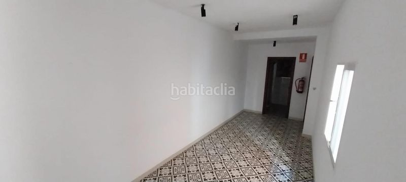 Foto 4e876ad9-b248-45cd-9750-e6f632a34b3c. Casa aparellada a Centre Alzira
