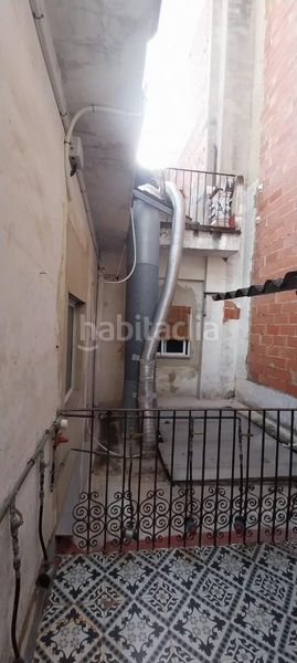Foto 5a775a86-cd92-4492-803a-9d710b746862. Casa aparellada a Centre Alzira