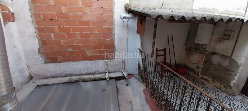 Foto 6a83dd2d-1c37-4ef9-9ebf-178c5c85ee57. Casa aparellada a Centre Alzira