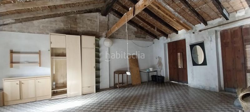 Foto f682f68f-1a51-4970-94f6-28557c2c7d1d. Casa aparellada a Centre Alzira