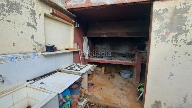 Foto c1320ca9-ed1c-42b7-a8bb-c09ad71029a6. Casa amb piscina a Centre Alzira