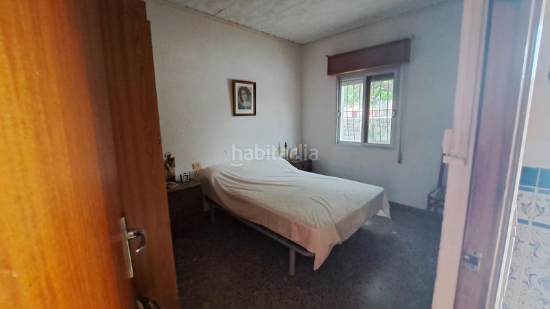 Foto feeeedb6-d8d5-49e3-a23c-1fcb1444c03e. Casa amb piscina a Centre Alzira