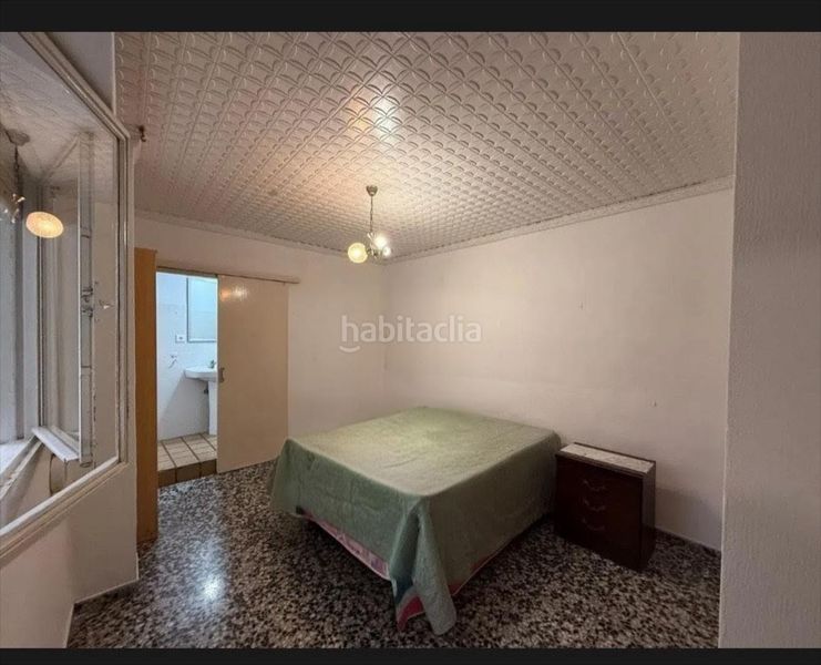 Foto 68d7713d-eef2-4660-b9f1-2a93fa081856. Casa adossada a Guadassuar