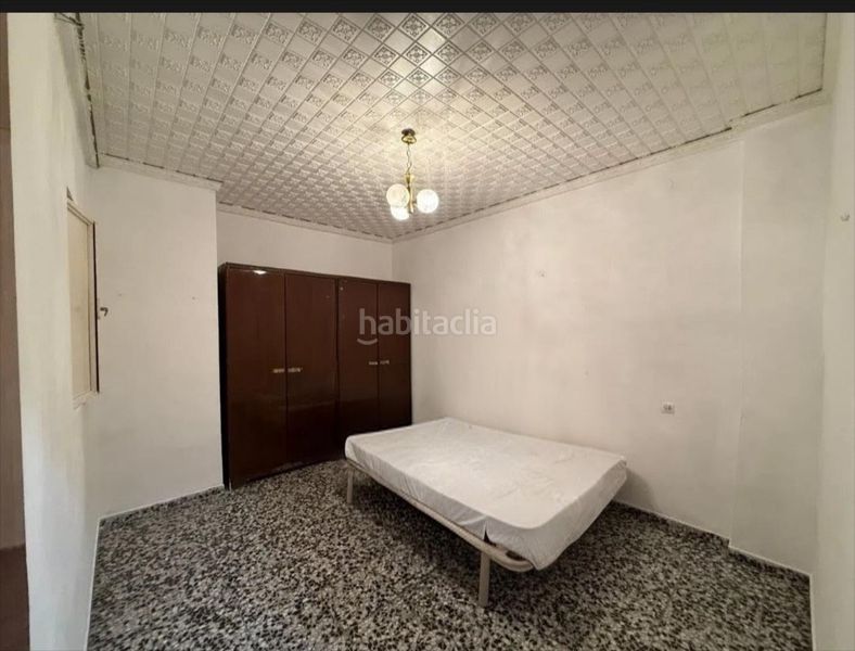 Foto 98493847-f52a-477b-a0bf-f24e96ce65a2. Casa adossada a Guadassuar