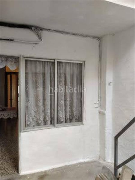 Foto 9a9fbc4a-6274-48d2-ba5a-3a70d8090e3a. Casa adossada a Guadassuar