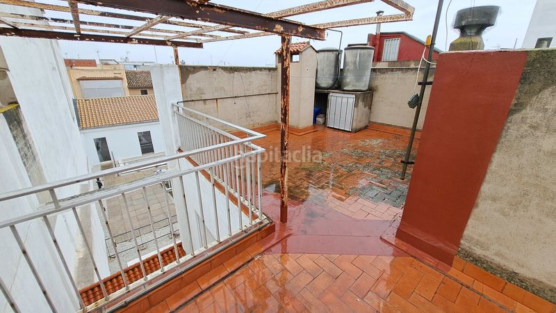 Foto f73ba991-2cae-4174-a437-4ad683244eff. Casa adossada a Guadassuar