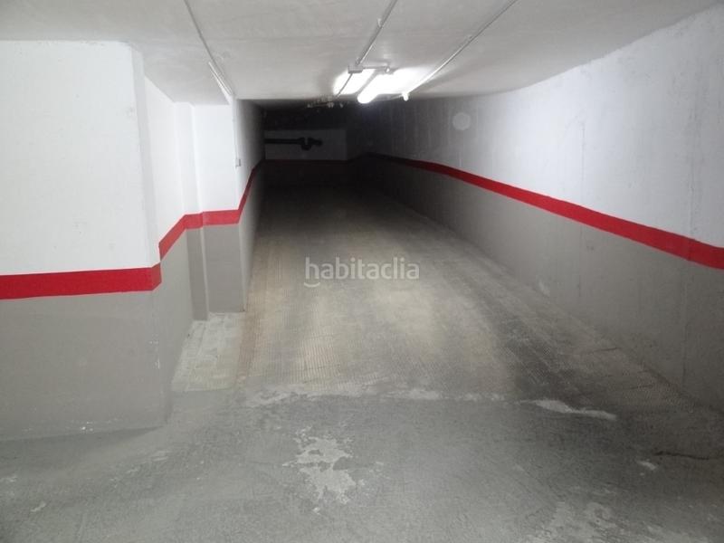 Foto f2b71a21-d63c-4018-bfb0-25a80b6af653. Autoparkplatz in Benifairó de la Valldigna