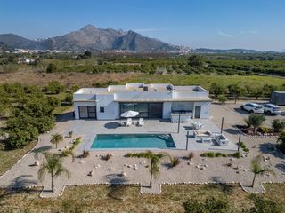 Casa a Tormos. Luxury modern villa on a 10,810m2 rustic plot in the orba valley