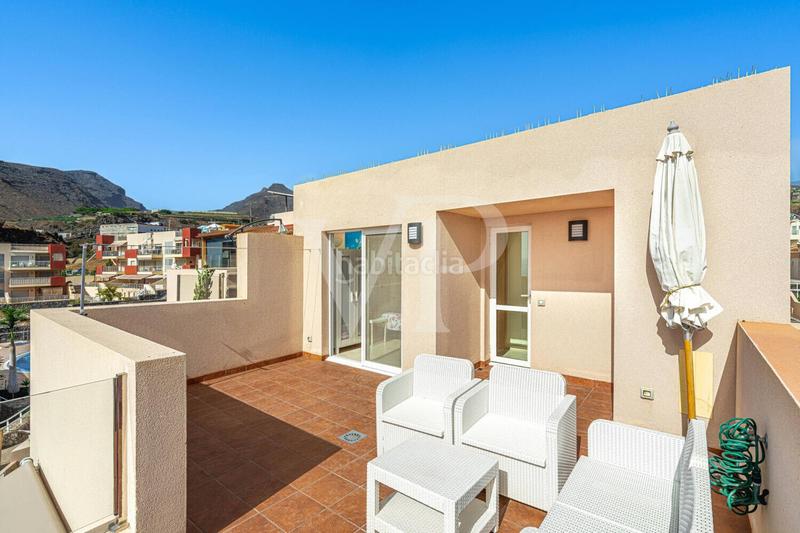 Foto aac0bde7-6af9-4d5b-b4ad-f9a3fd786588. Casa a schiera con parcheggio in Puerto de Santiago Santiago del Teide