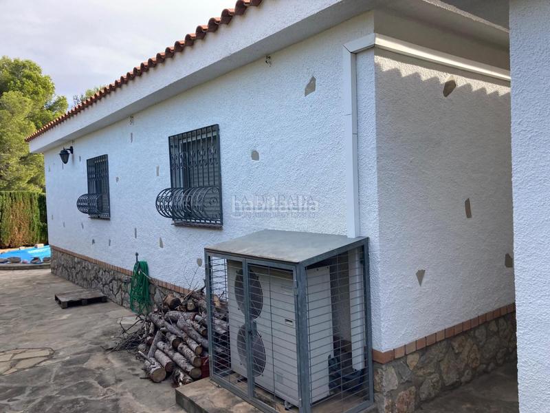 Foto d7e8d50b-a425-4cb9-936a-e5dd91738e5c. Chalet con camino parcheggio piscina in Platja de Mont-roig Mont-roig del Camp