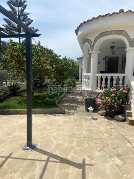 Foto f146fe39-09a3-415e-8edf-5aa00073985f. Chalet con camino parcheggio piscina in Platja de Mont-roig Mont-roig del Camp