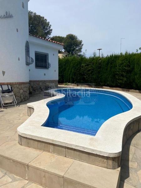 Foto f2965e19-983a-466f-88a6-c50b408e4a6e. Chalet con camino parcheggio piscina in Platja de Mont-roig Mont-roig del Camp