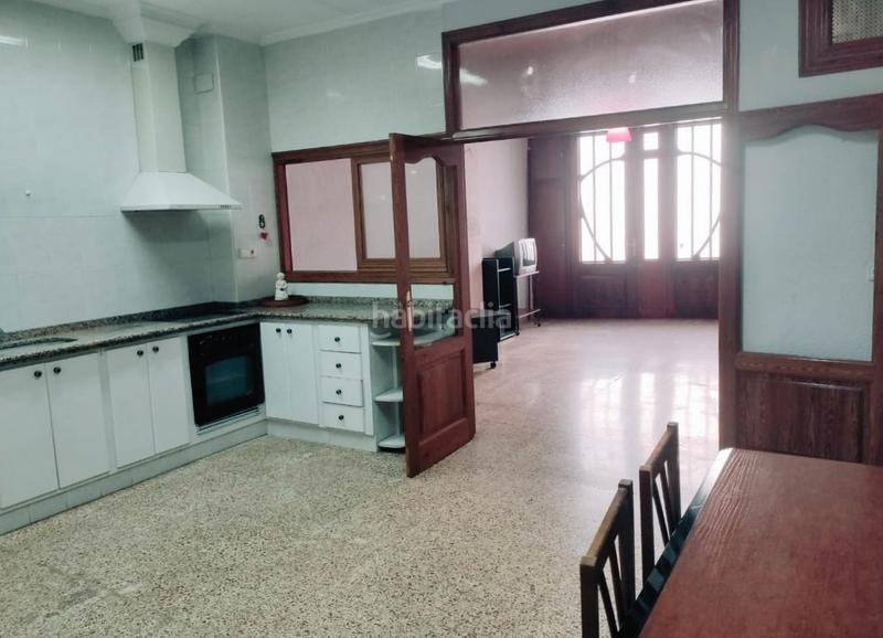 Foto 3e64d2ce-f768-45c6-8385-a8b85d259f88. Reihenhaus mit parking in Sueca Sueca