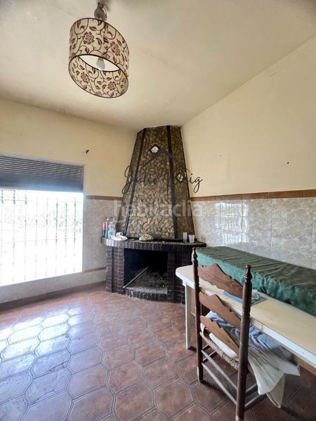 Foto a49f54e6-4ecb-4d4a-8818-099b2af7d579. Casa amb xemeneia a Puebla del Río (La)