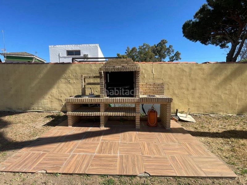 Foto 9b60967d-9abd-439d-b1fb-fcd728177fce. Xalet amb xemeneia calefacció aparcament piscina a Chiclana de la Frontera