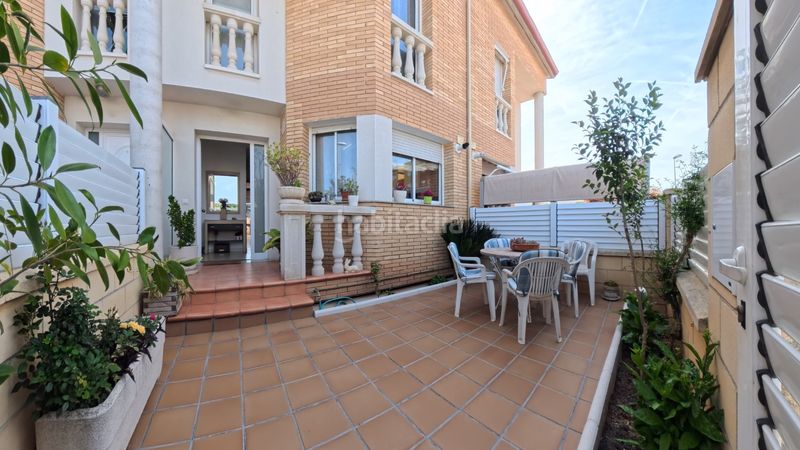 Foto eba44db9-a3a4-4a02-b0c6-f64ed0e246db. Casa adossada amb calefacció aparcament piscina a Cunit