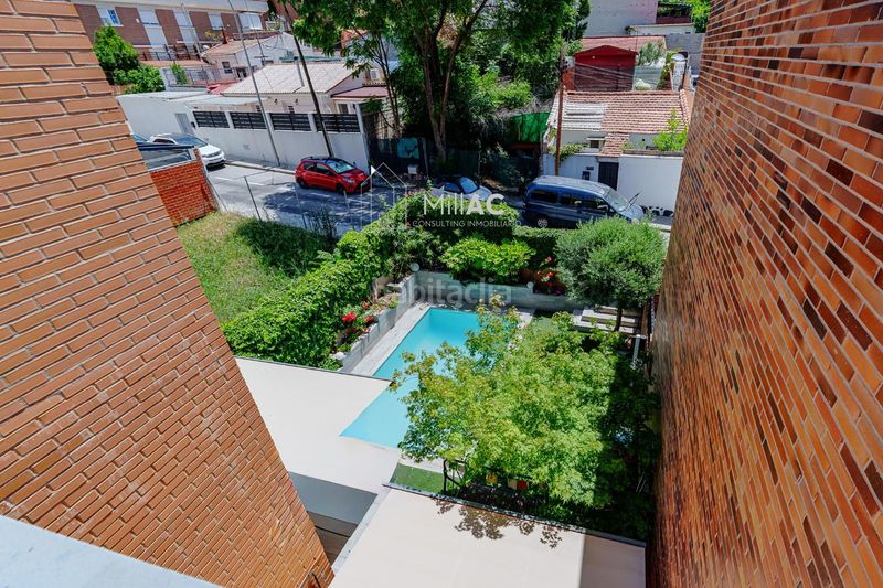 Foto 3448159d-aff6-4f9b-8339-99cf48da3de1. Casa adossada amb calefacció aparcament piscina a Madrid