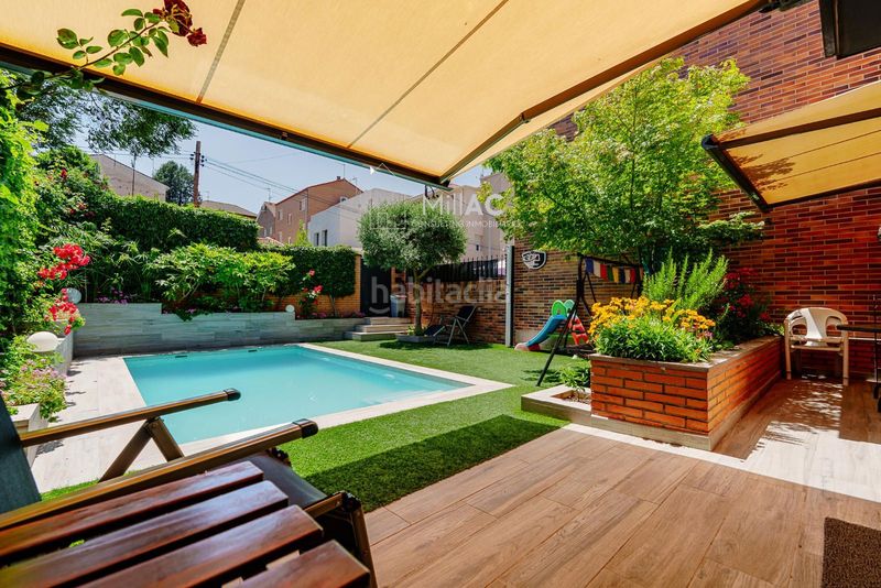Foto fe296e4a-7d83-48a1-87c7-a31d75e5554d. Casa adossada amb calefacció aparcament piscina a Madrid