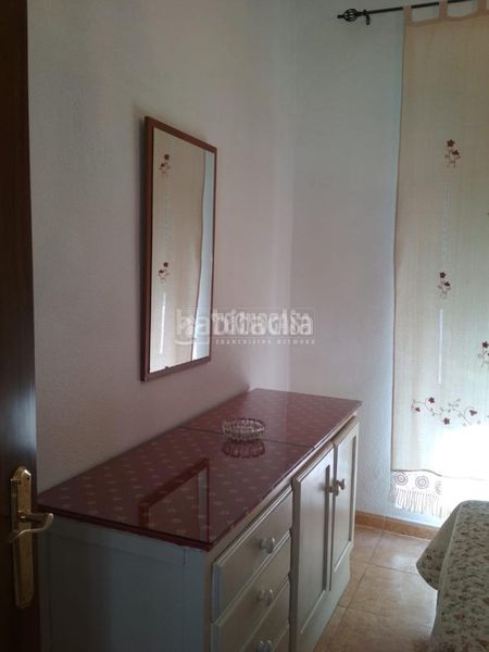 Foto acae0bf6-3906-4c14-b5e6-49ad02599725. Casa aparellada a Centro ciudad Linares