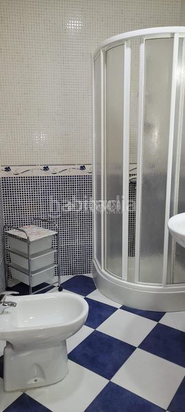 Foto f7195d6e-c855-4228-9e00-66b295f05763. Casa aparellada a Centro ciudad Linares