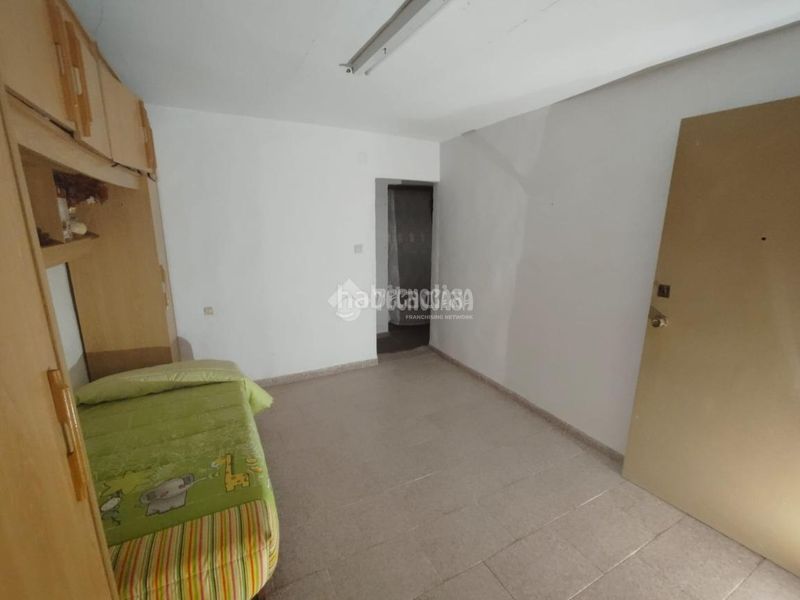 Foto 5c74fee1-32a6-4d8b-bedb-b78d64df8553. Casa aparellada a Villatorres