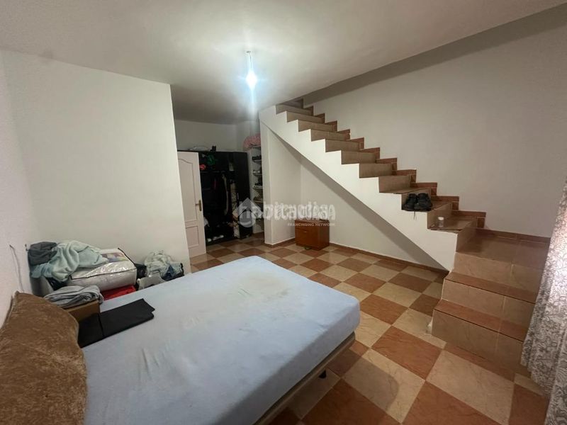 Foto c481be17-1367-42c4-89f8-d21fc79c90e9. Casa aparellada a Mengíbar