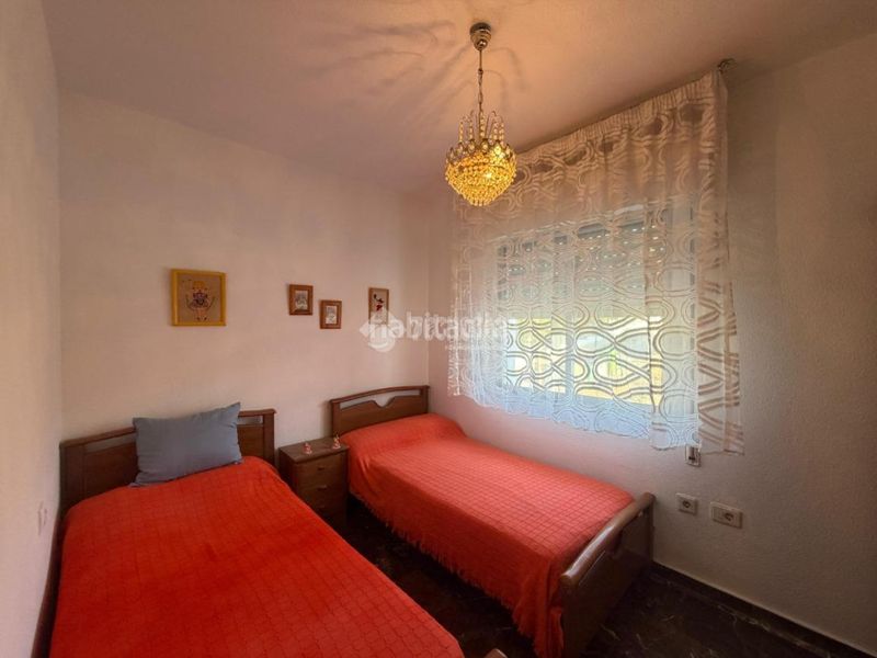 Foto 80228e3f-4b1d-4ea7-ba28-910089f6aede. Casa aparellada amb aparcament a Mengíbar