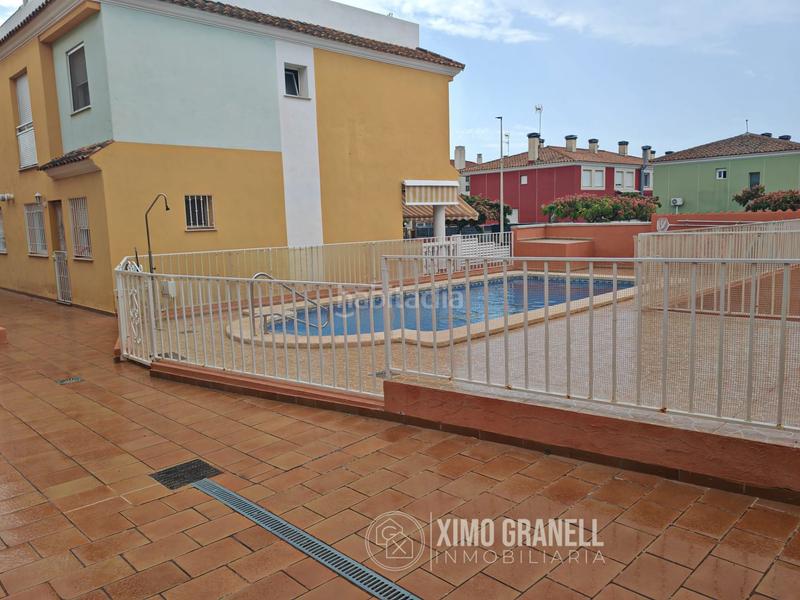 Foto ff898cea-0c11-4d4b-b969-5931aa3ccf69. Casa bajada de precio!! magnifico adosado con piscina y plaza de garaje en Moncofa