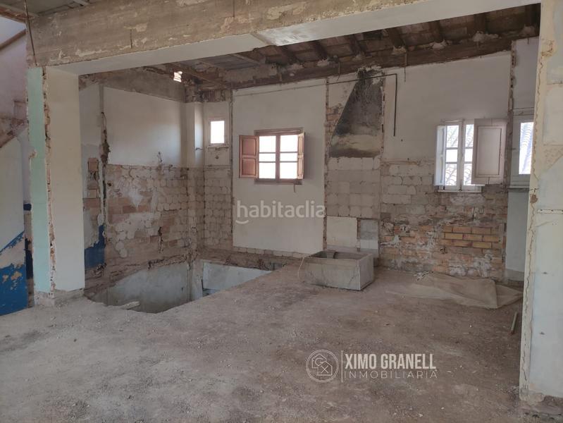 Foto 8483f838-6e54-4440-8008-966fe11bc432. Casa adosado de cuatro plantas sin terminar en zona del angel en Vall d´Uixó (la)