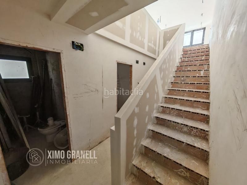 Foto 2472685a-eadb-43ac-9799-70eec93771f2. Casa vivienda unifamiliar en el poligono iii de la vall duixó con garaje, patio, buhardilla y gran terraza en Vall d´Uixó (la)