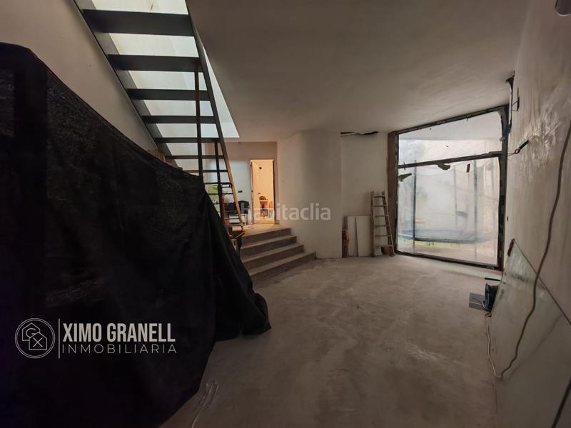 Foto 6a648b7e-19d8-4409-a283-aeb1e67308fe. Casa vivienda unifamiliar en el poligono iii de la vall duixó con garaje, patio, buhardilla y gran terraza en Vall d´Uixó (la)