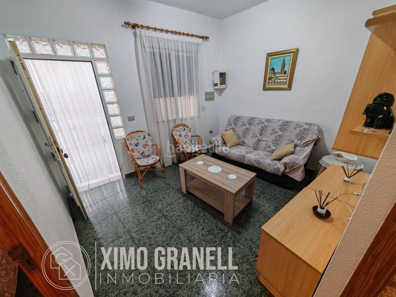 Foto c26ef89c-ca4c-475c-9e3b-57ec1cc41654. Casa planta baja esquinera con terraza en centro de playa en Moncofa
