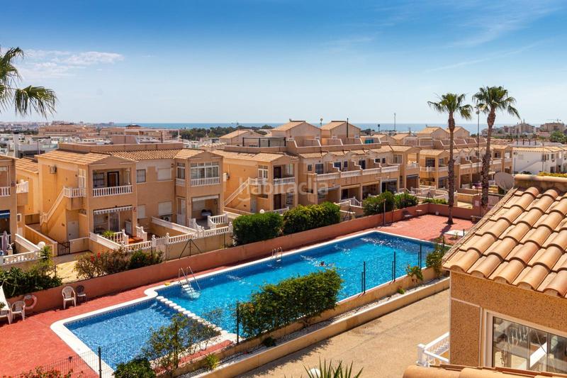 Foto e027c454-9fc2-4eca-8423-55dfbe1b4766. Maison jumelée avec parking piscine dans Los Balcones y los Altos Orihuela