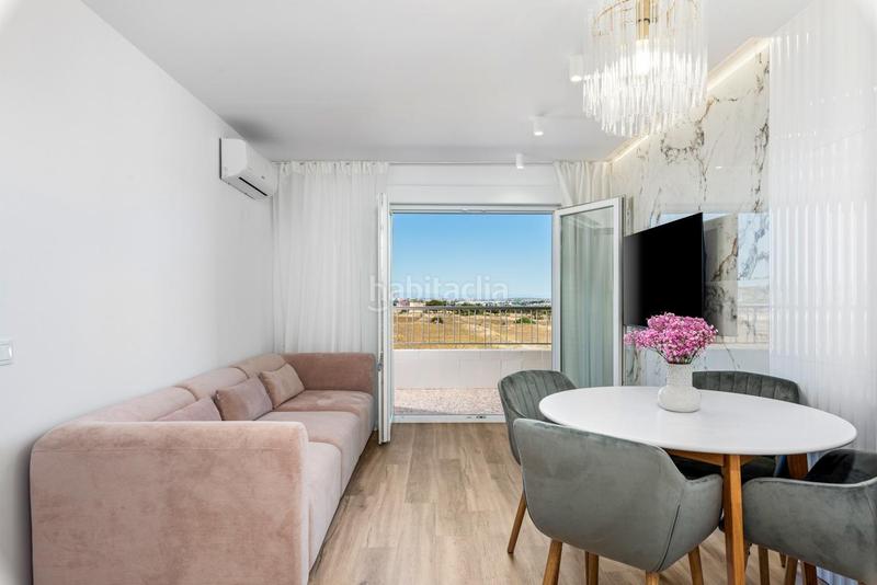 Foto 50c6ea4c-72f8-41c3-b41b-1398c33d0c93. Apartamento en Punta Prima Torrevieja