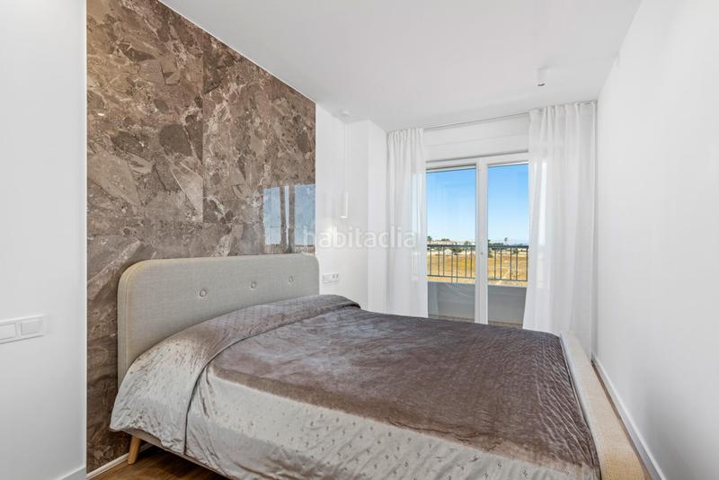 Foto 826b654f-6d0d-4138-a43d-53ec10db4541. Apartamento en Punta Prima Torrevieja