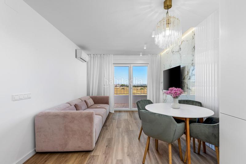 Foto c0d89700-0e17-4157-8fce-f8b0f651fe95. Apartamento en Punta Prima Torrevieja