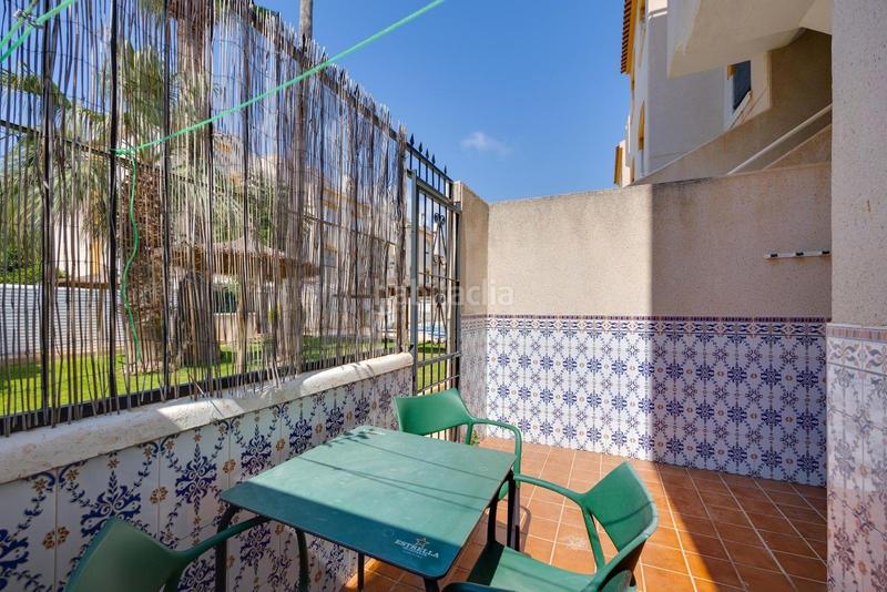 Foto f9fb9b9c-4f76-49d8-b9bf-e71b5c2fd295. Planta baja apartamento en planta baja en venta en Punta Prima en Torrevieja