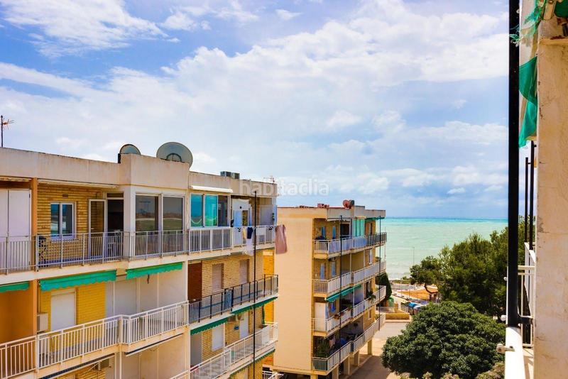 Foto ae237f98-0196-408c-89de-f375cd356101. Apartamento encantador apartamento de 3 dormitorios en Punta Prima cerca del mar en Orihuela