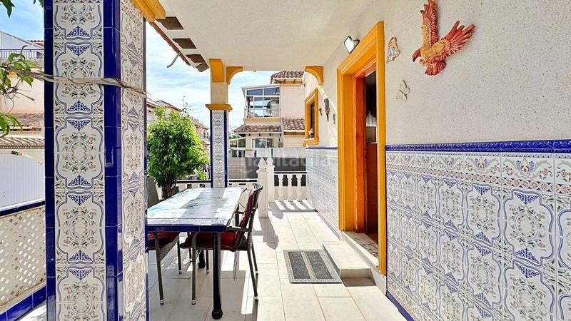 Foto 284cd466-99e2-45bb-91a3-6ac7565d8139. Dúplex encantadora casa adosada de dos dormitorios con piscina comunitaria cerca del mar en Orihuela